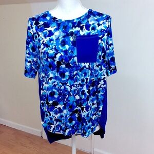 NWOT. Royal blue floral top size Medium